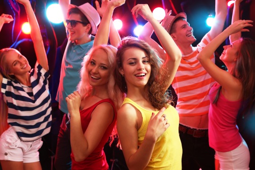 Young People Having Fun Dancing At Party.