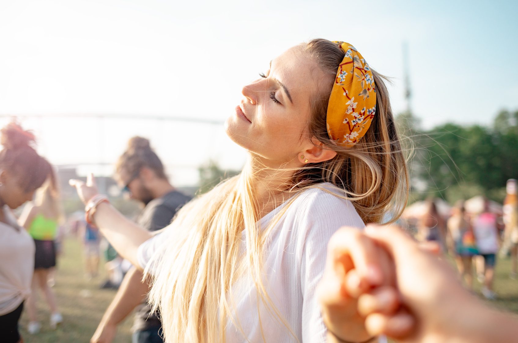 Group Of Friends Having Fun At Summer Music Festival